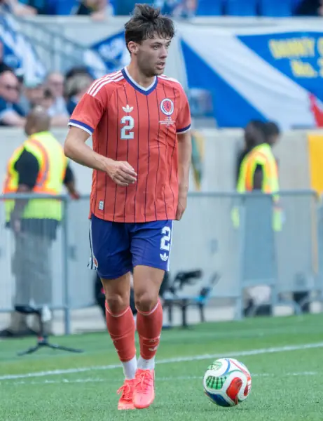 Aaron Hickey Scotland v Bolivia. In possession assessing options.