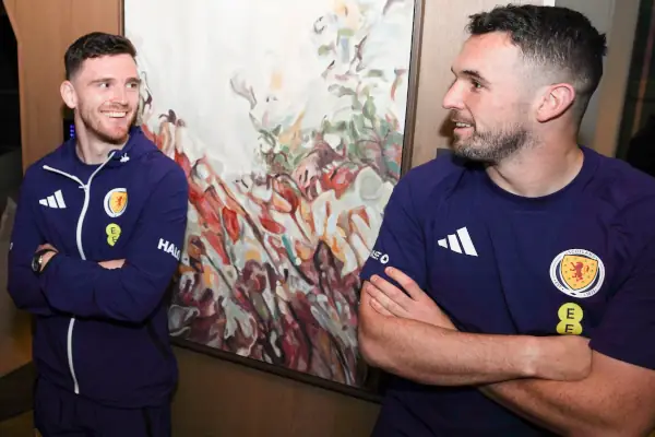 Andy Robertson & John McGinn joking indoors 25 03 2026.
