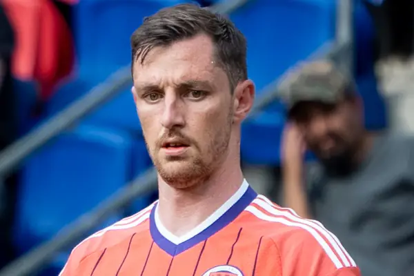 Dominic Hyam for Scotland v Bolivia. Head & shoulders, on pitch.