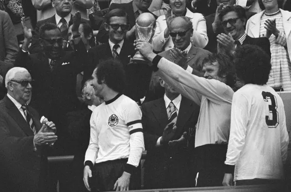 Franz Beckenbauer Sepp Maier Paul Breitner. Maier lifts the World Cup after winning the 1974 final.