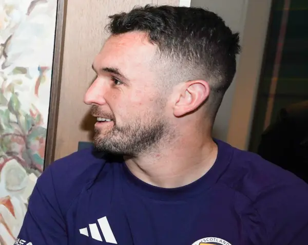 John McGinn indoors wearing Scotland gear, 25 March 2026.