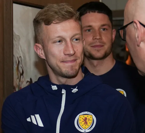 Ross McCrorie & George Hirst in line meeting John Swinney.