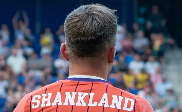 Lawrence Shankland Scotland v Bolivia. Head & shoulders from behind, Name on jersey.