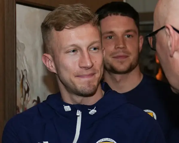 Ross McCrorie & George Hirst in line meeting John Swinney.